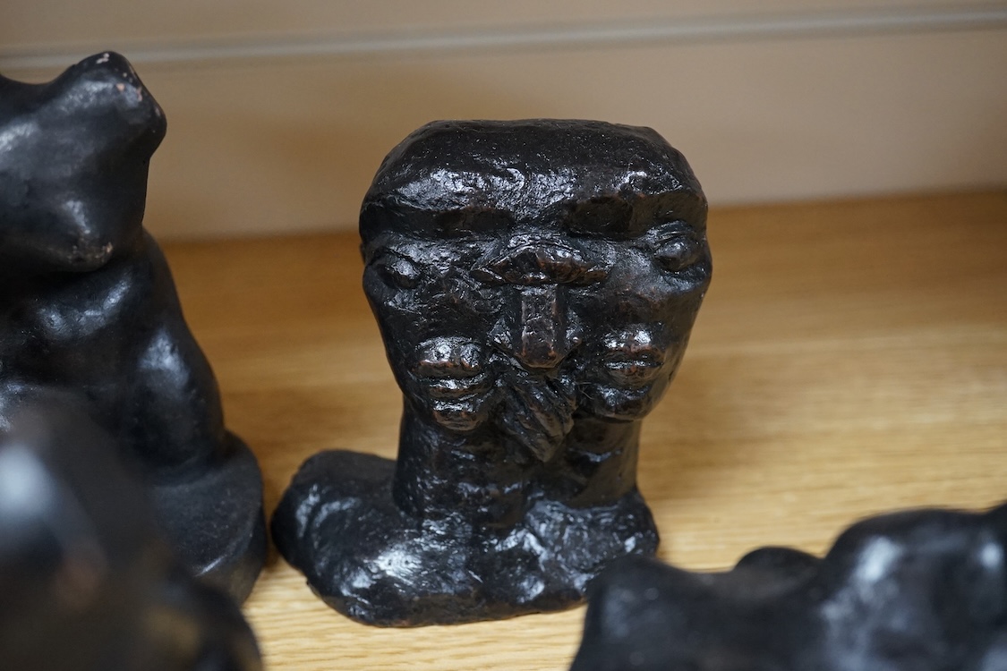 Three pairs of small black figural abstract sculptures, together with two similar sculptures. (8). Tallest 15cm high